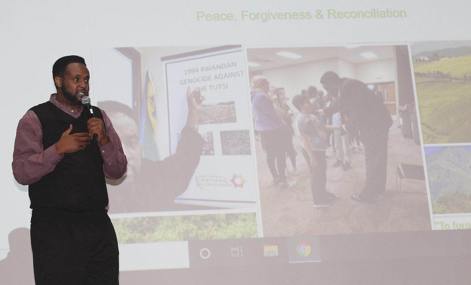 Kizito Kalima, a Rwanda genocide survivor, speaks Tuesday to Southmont Junior High School students.